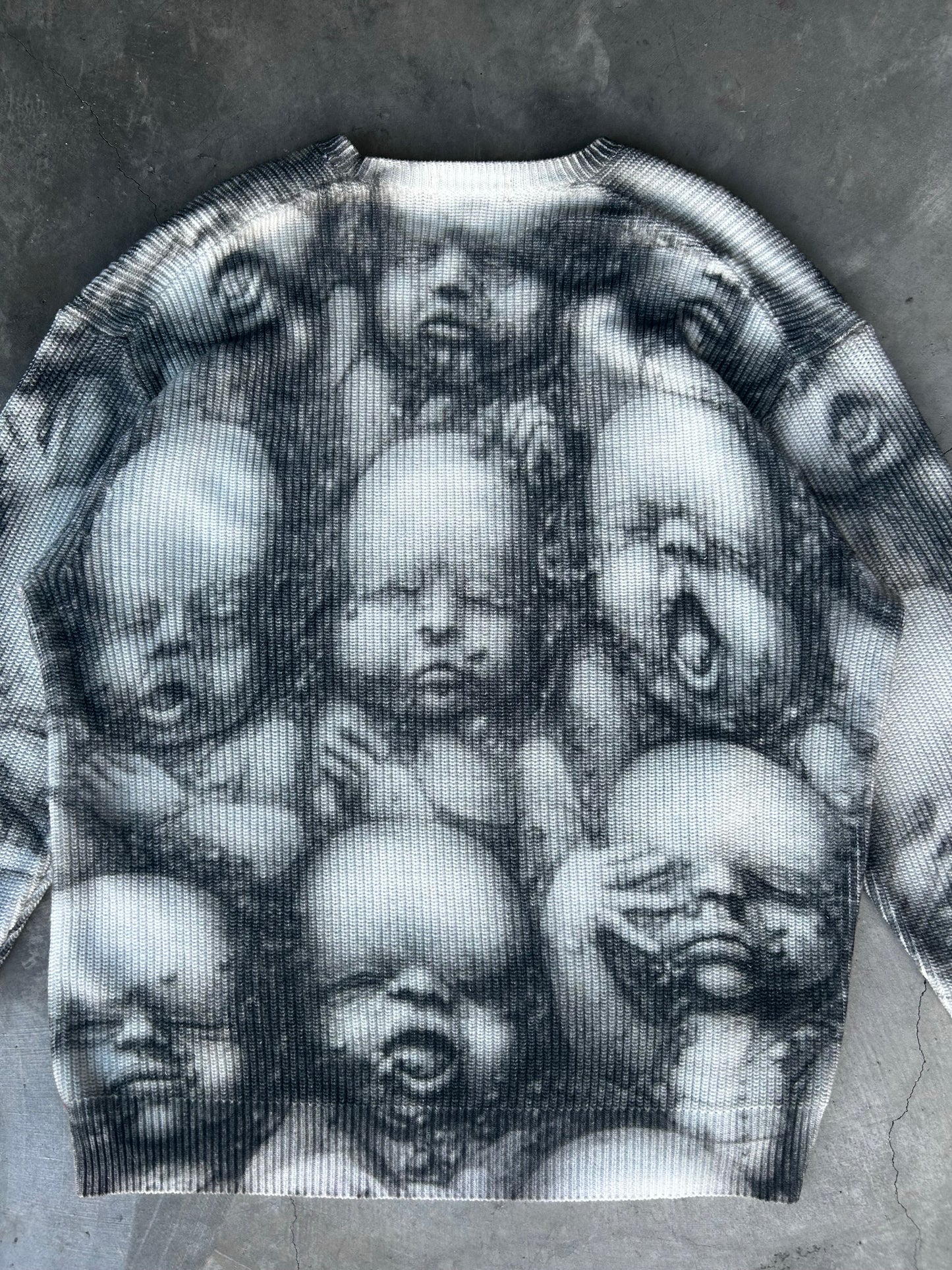 Supreme x H.R. Giger baby sweater