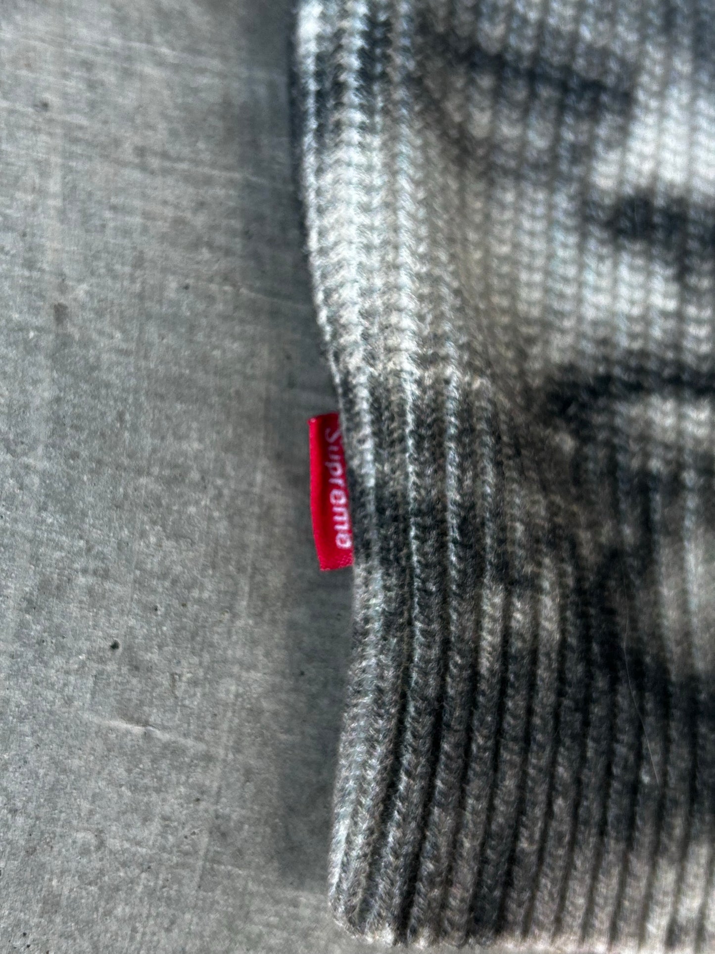 Supreme x H.R. Giger baby sweater