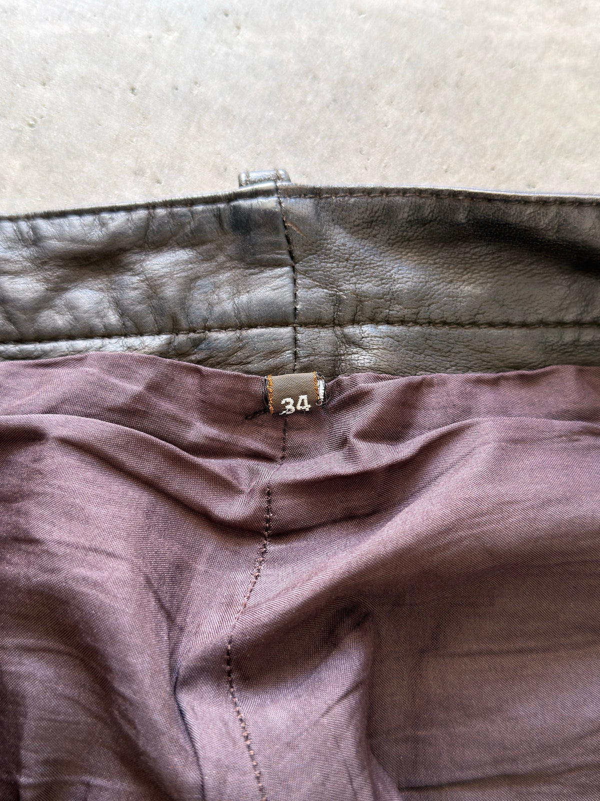 thrashed brown leather pant